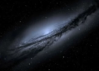 Astrónomos detectan galaxia casi invisible con 99% de materia oscura galaxia invisible 2026