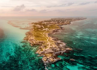 Isla Mujeres en riesgo: desarrollo de lujo y presión ambiental en 2026 tendencias turismo isla mujeres